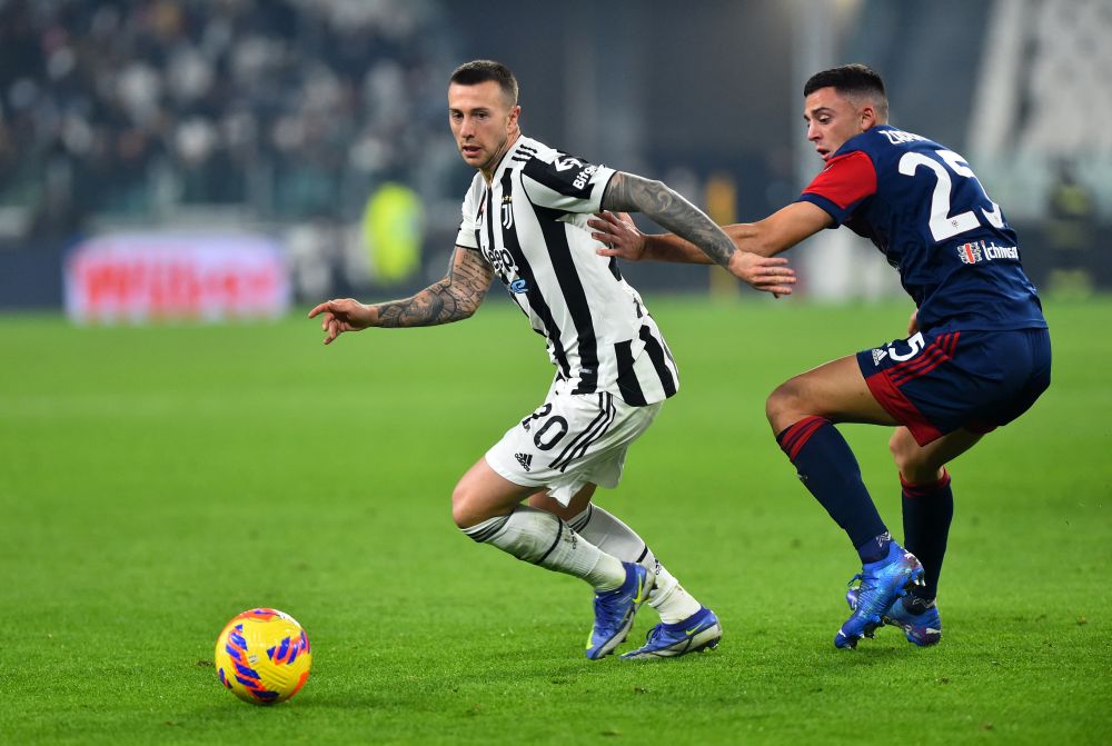 Juventus' Federico Bernardeschi in action with Cagliari's Gabriele Zappa at Allianz Stadium, Turin December 21, 2021. u00e2u20acu201d Reuters picnn