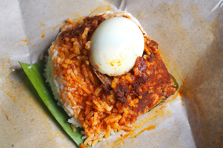 Start the day right with 'nasi lemak bungkus' from D'Ai Nor where the highlight is a spicy, slightly smoky 'sambal'