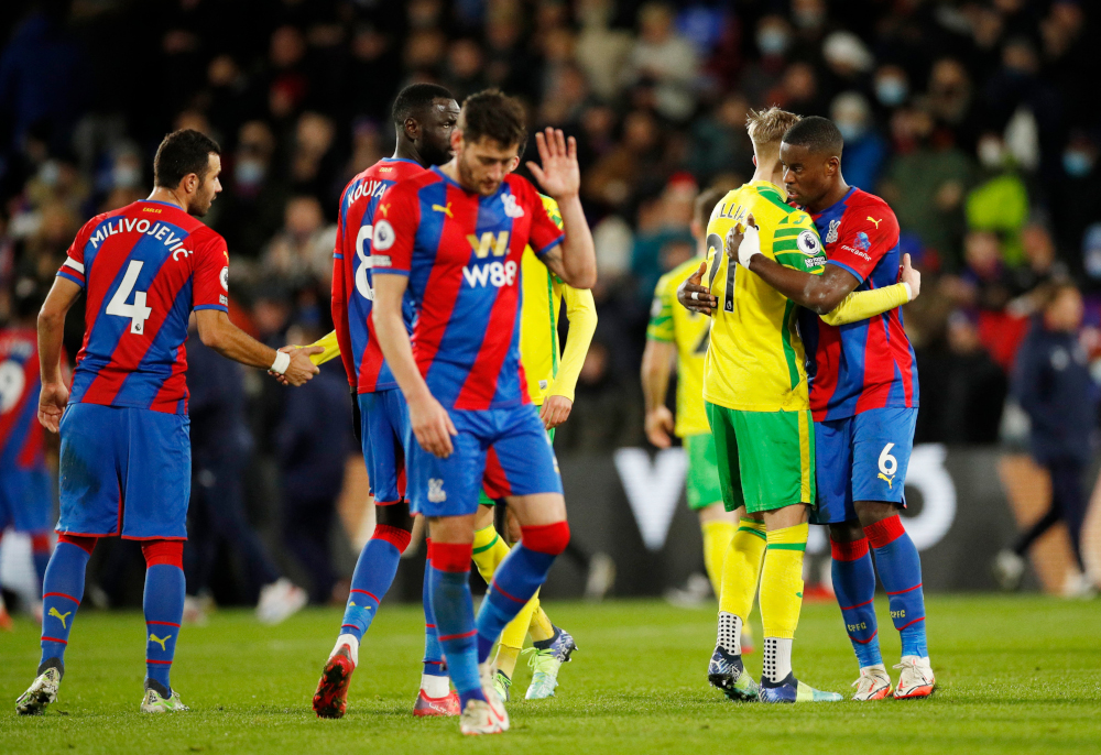 Norwich Cityu00e2u20acu2122s Brandon Williams with Crystal Palaceu00e2u20acu2122s Marc Guehi after the match at Selhurst Park, London, Britain, December 28, 2021. u00e2u20acu201d Action Images via Reuters