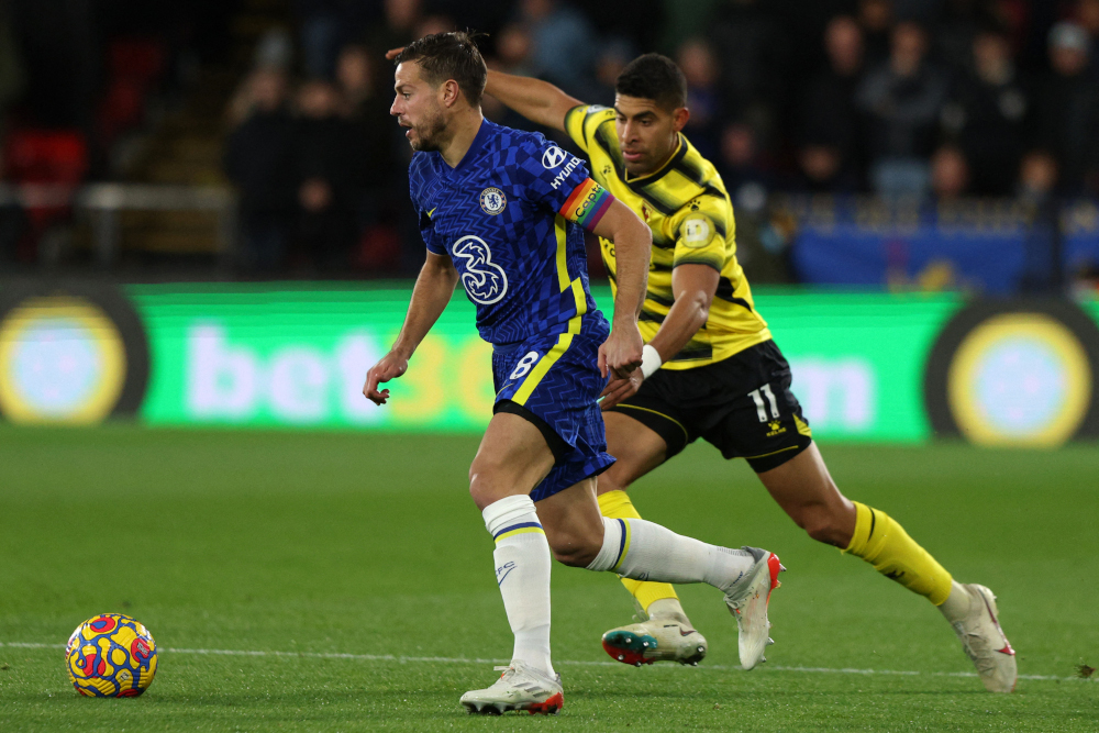 Chelsea defender Cesar Azpilicueta vies with Watford defender Adam Masina at Vicarage Road Stadium in Watford, north-west of London, December 1, 2021. u00e2u20acu201d AFP pic 