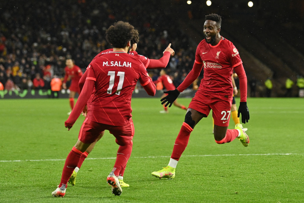Liverpool striker Divock Origi celebrates after he scores his teamu00e2u20acu2122s opening goal during the EPL match between Wolverhampton Wanderers and Liverpool at the Molineux stadium in Wolverhampton, December 4, 2021. u00e2u20acu201d AFP picnn