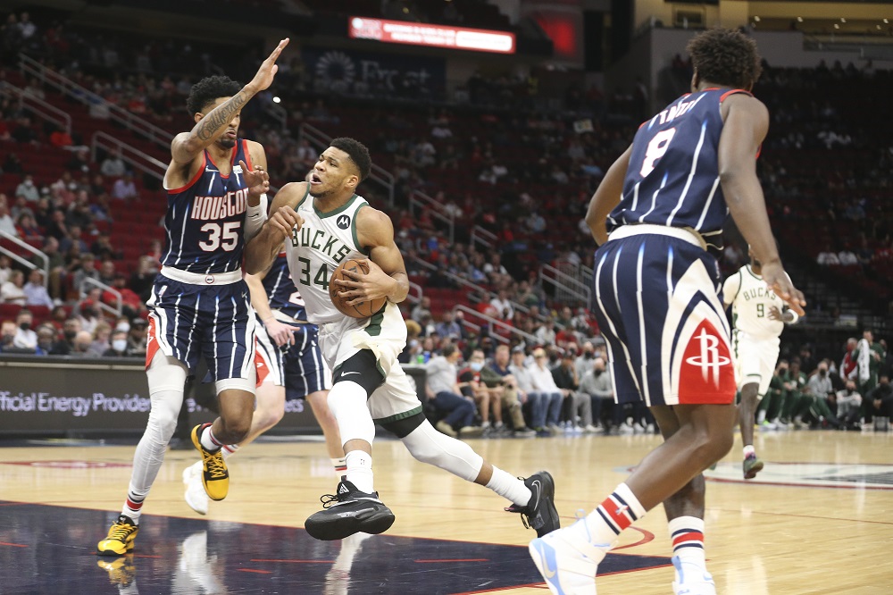 Milwaukee Bucks forward Giannis Antetokounmpo (34) drives against Houston Rockets centre Christian Wood (35) in the first quarter at Toyota Center in Houston December 10, 2021. u00e2u20acu2022 Thomas Shea-USA TODAY Sports via Reuters