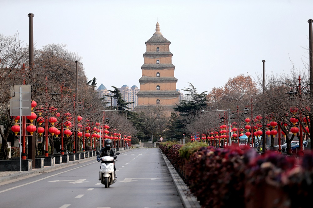 A rider travels on an empty in Xian, Shaanxi province, China December 26, 2021. u00e2u20acu2022 cnsphoto via Reuters