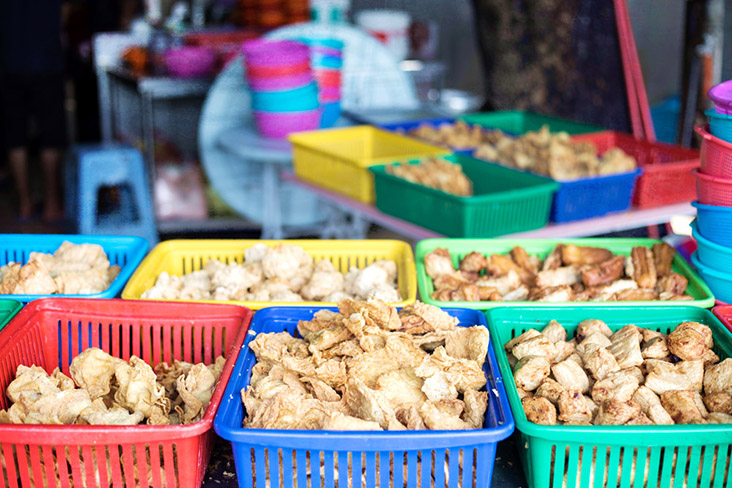 Colourful plastic baskets with different types of irresistible 'yong tau foo.'
