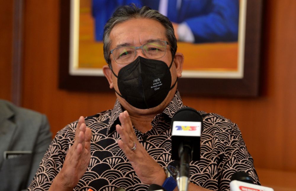 Minister in the Prime Ministeru00e2u20acu2122s Department (Special Duties) Datuk Dr Abd Latiff Ahmad speaking at a press conference on the latest developments in the flood disaster, at the Prime Ministeru00e2u20acu2122s Department in Putrajaya, December 29, 2021. u00e2u20acu201d Bernama pic