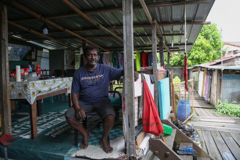 Magai Valthymanikam speaks to Malay Mail during an interview in front of his home at Kampung Kudei in Satok December 10, 2021. u00e2u20acu201d Picture by Yusof Mat Isann