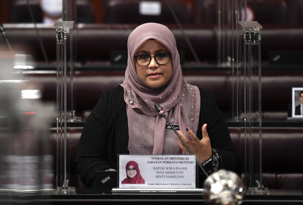 Deputy Minister in the Prime Ministeru00e2u20acu2122s Department (Parliament and Law), Datuk Mas Ermieyati Samsuddin answers a question at the Dewan Negara Conference at Parliament Building, December 22, 2021. u00e2u20acu201d Bernama pic 