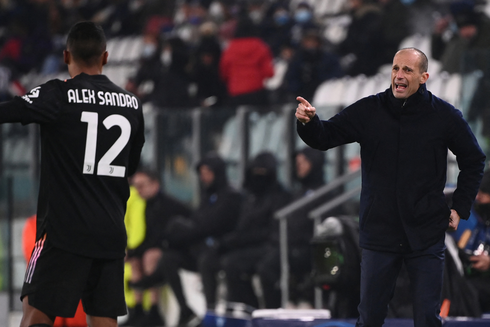 Juventus head coach Massimiliano Allegri gives instructions to Alex Sandro during the Uefa Champions League Group H football match between Juventus and Malmo, December 8, 2021 at the Juventus stadium in Turin. u00e2u20acu201d AFP pic 