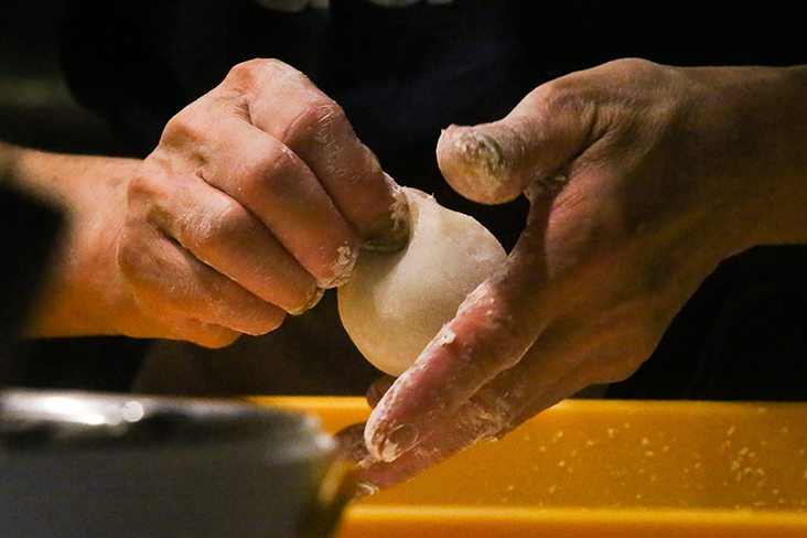 You will find skilled hands like Mrs Okamoto moulding fluffy cloud-like 'mochi' filled with their home made red bean paste.