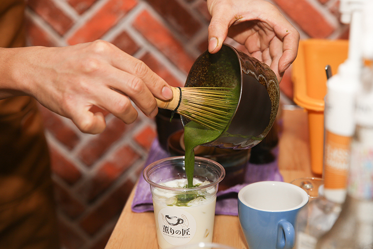 The matcha is hand whisked before it is added to creamy milk to create their signature latte.