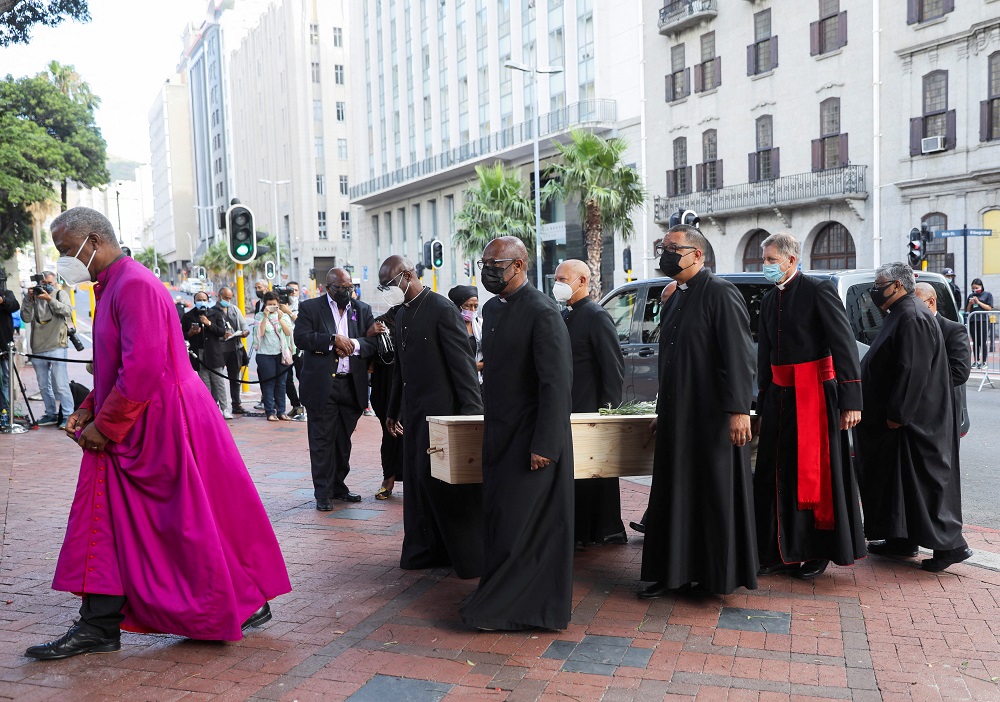 Archbishop of Cape Town Thabo Makgoba walks in front of the casket containing the body of Archbishop Desmond Tutu during arrival at St Georgeu00e2u20acu2122s cathedral for his lying in state, in Cape Town, South Africa December 30, 2021. u00e2u20acu2022 Reuters pic