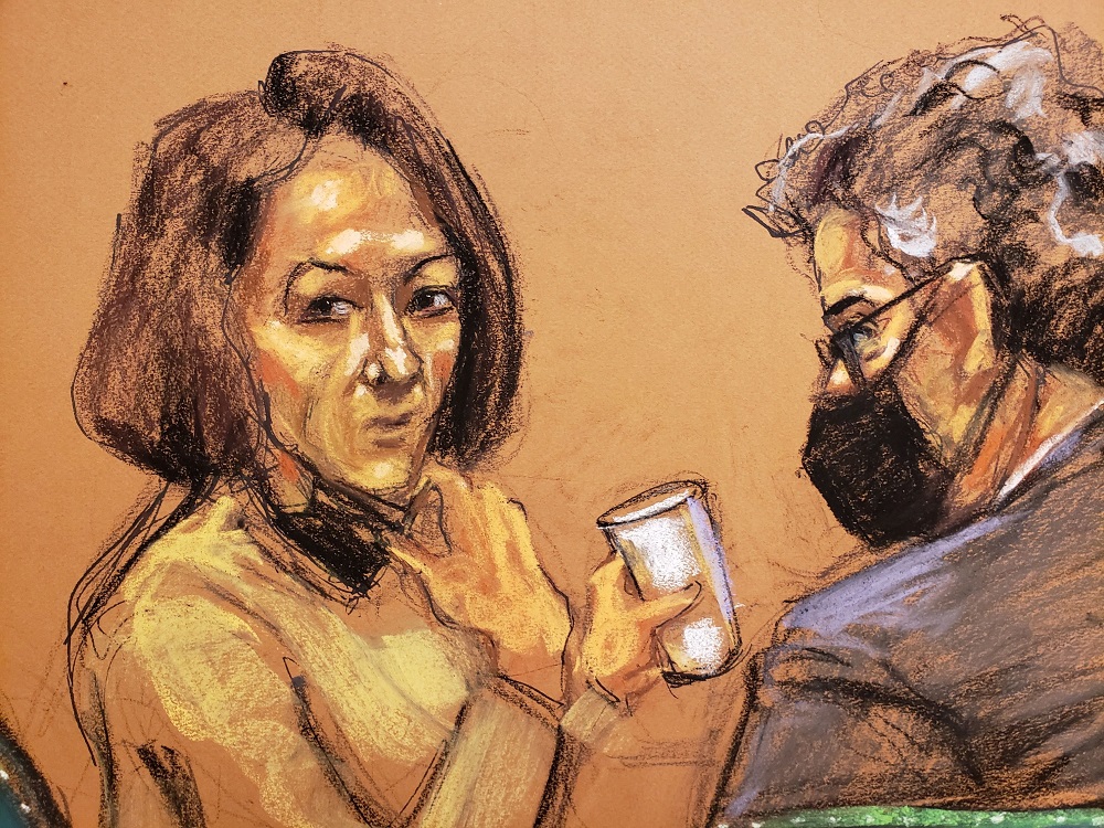 Jeffrey Epstein associate Ghislaine Maxwell pulls down her mask to sip from a cup as deliberations extended into a second week in a courtroom sketch in New York December 27, 2021. u00e2u20acu2022 Reuters pic