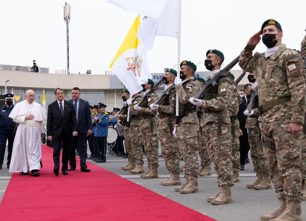 Cyprus President Nicos Anastasiades accompanies Pope Francis during a farewell ceremony before departing to Athens at the Larnaca International Airport in Larnaca, Cyprus December 4, 2021. u00e2u20acu201d Reuters pic