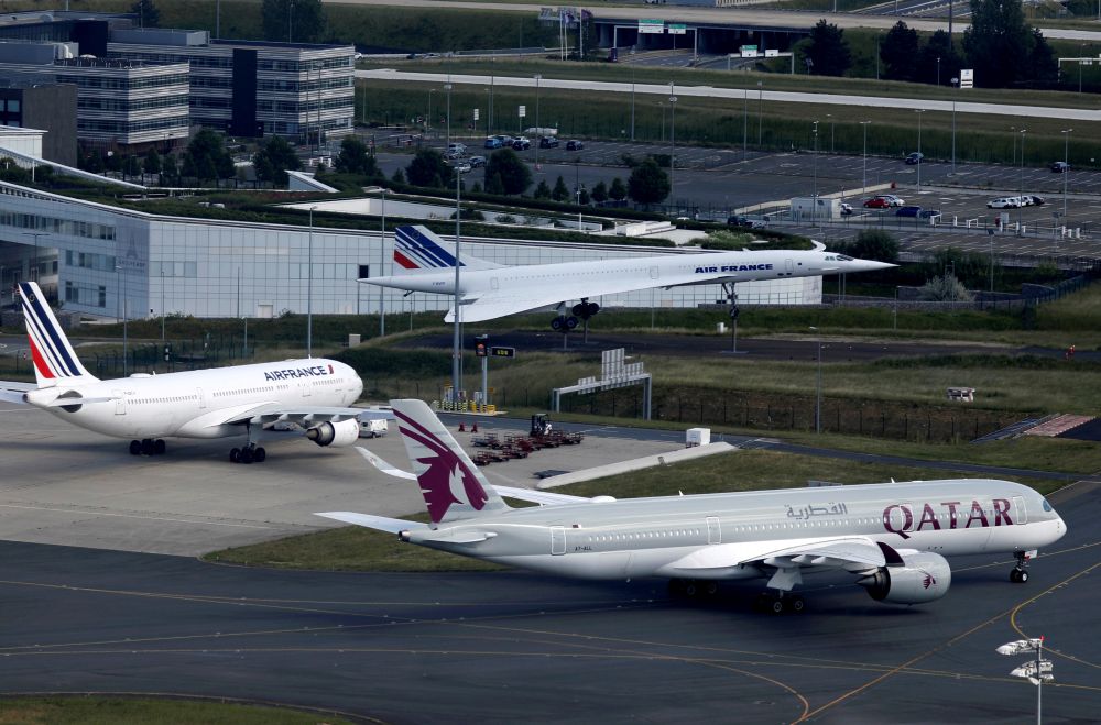 A Qatar Airways Airbus A350 passes by the retired Air France Concorde number 5 on the tarmac at Paris Charles de Gaulle airport in Roissy-en-France on May 25, 2020. u00e2u20acu201d Reuters pic