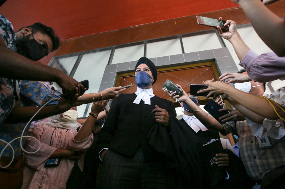 Lawyer Datuk Rajpal Singh speaks to the press at the High Court in Ipoh December 7, 2021. — Picture by Farhan Najib