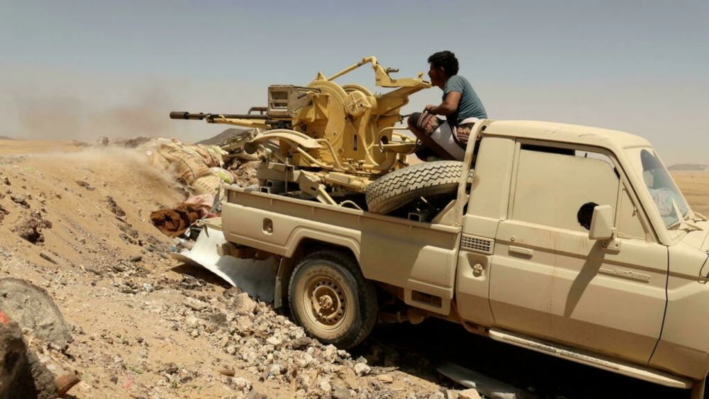 A Yemeni government fighter fires a vehicle-mounted weapon at a frontline position during fighting against Houthi rebels in Marib, Yemen on March 28, 2021. u00e2u20acu201d AFP pic