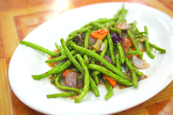 Stir fried long beans with garlic and sliced carrots.