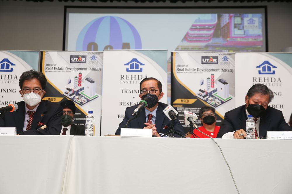 Datuk Soam Heng Choon (centre) speaks during a press conference at Wisma Rehda in Petaling Jaya December 15, 2021. u00e2u20acu201d Picture by Choo Choy May