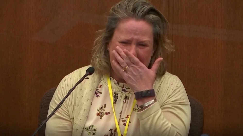 Former Minnesota police officer Kimberly Potter breaks down in tears as she testifies during her trial in Brooklyn Centre, Minnesota December 17, 2021 in this image taken from court television footage. u00e2u20acu2022 Pool footage/Handout via Reuters