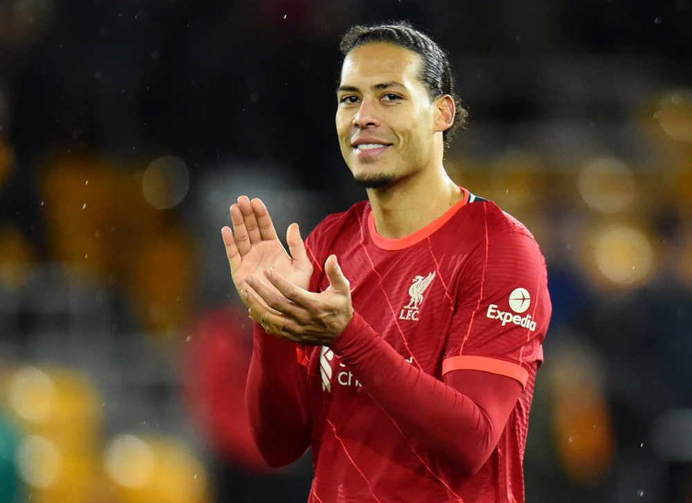 Liverpoolu00e2u20acu2122s Virgil van Dijk celebrates after the match against Wolverhampton Wanderers at Molineux Stadium, Wolverhampton, Britain, December 4, 2021. u00e2u20acu201d Reuters pic