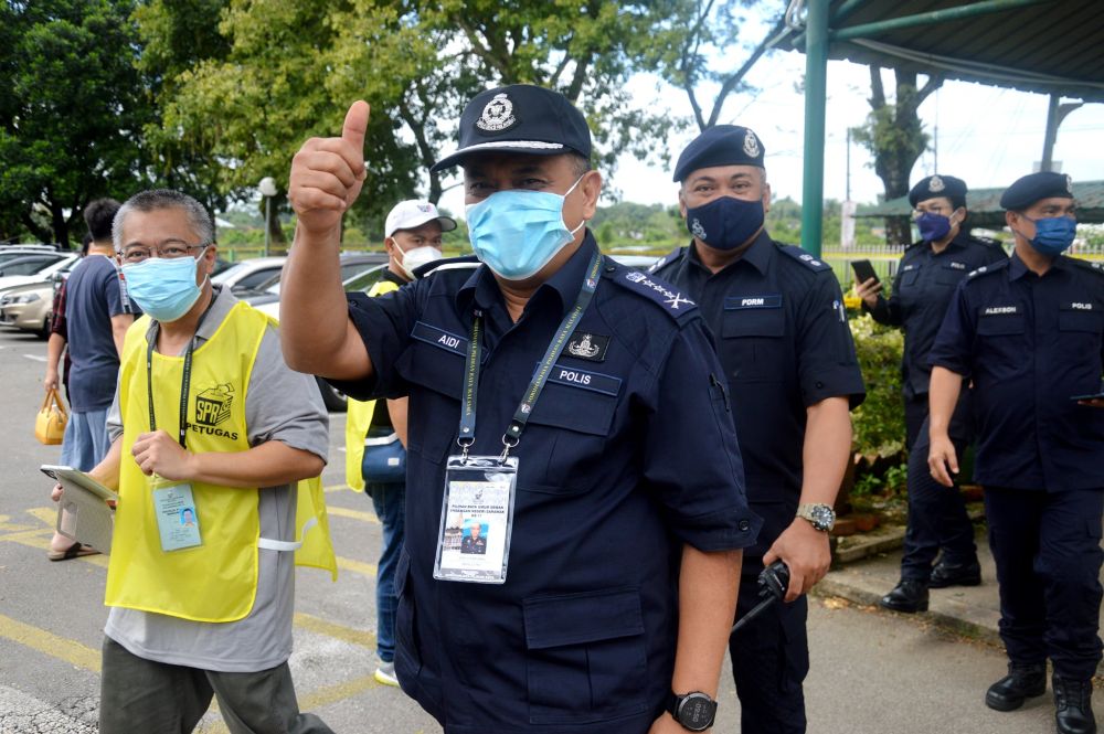 Aidi gives a thumbs up during one of his visits to the polling centres today. u00e2u20acu2022 Picture via Facebookn