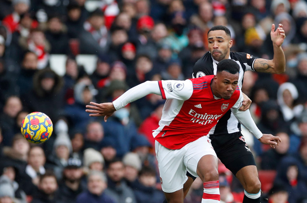 Newcastle Unitedu00e2u20acu2122s Callum Wilson in action with Arsenalu00e2u20acu2122s Gabriel at Emirates Stadium, London, Britain, November 27, 2021. u00e2u20acu201d Action Images via Reuters
