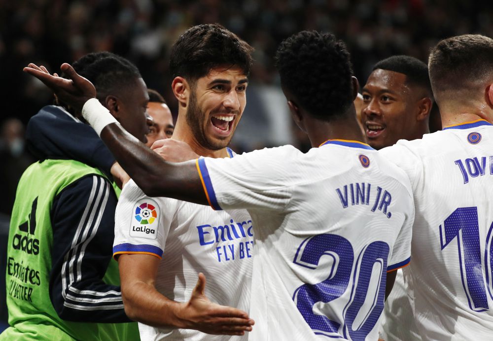 Real Madrid's Marco Asensio celebrates scoring their second goal against Atletico Madrid with Vinicius Junior at Santiago Bernabeu, Madrid December 12, 2021. u00e2u20acu201d Reuters pic 