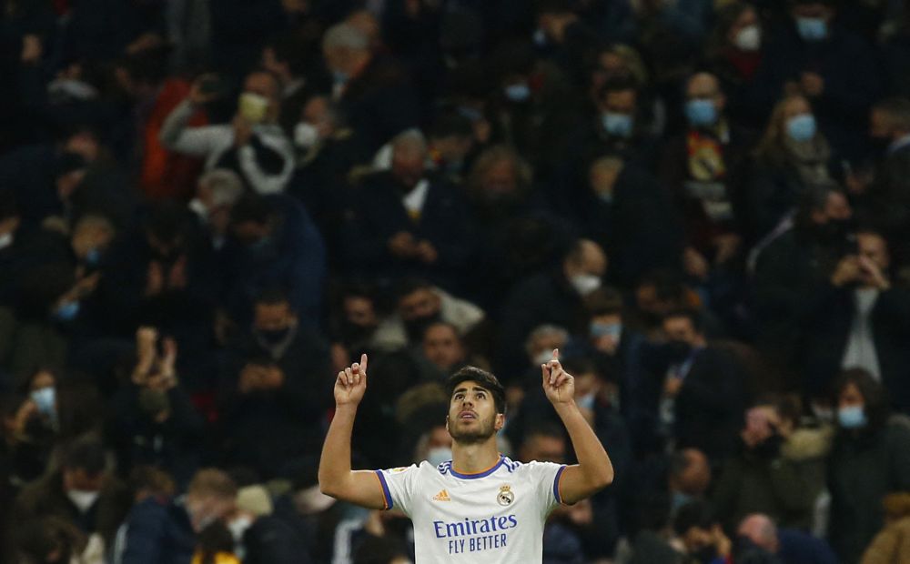 Real Madrid's Marco Asensio celebrates scoring their second goal against Atletico Madrid with Vinicius Junior at Santiago Bernabeu, Madrid December 12, 2021. u00e2u20acu201d Reuters pic 
