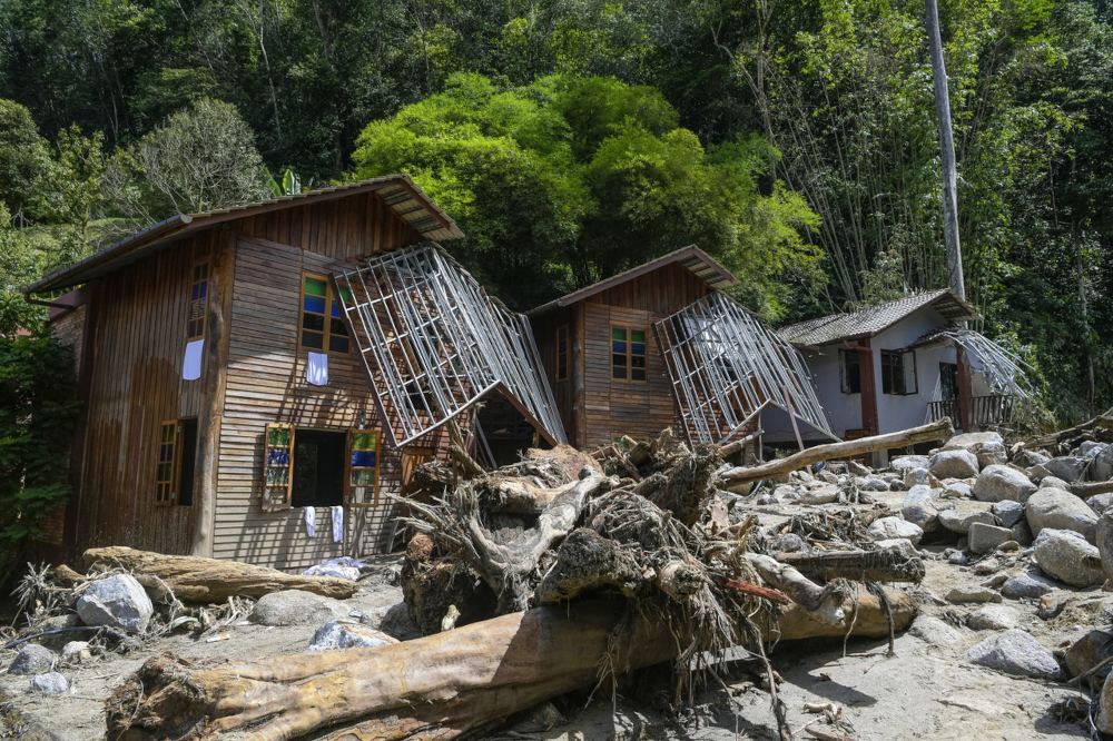 A row of chalets damaged by strong river currents in Bentong, Pahang, December 20, 2021. u00e2u20acu201d Bernama pic 