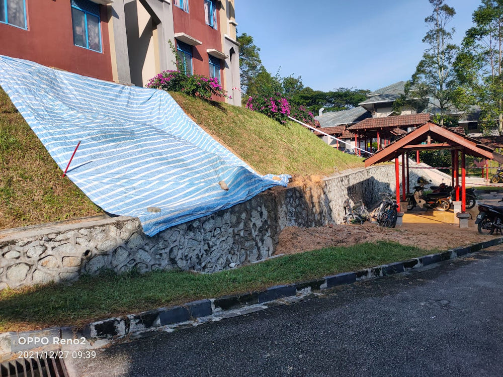 A landslide is seen near the Mahallah Zubair male dormitory of the International Islamic University Malaysia (IIUM), Gombak December 27, 2021. u00e2u20acu201d Picture via Twitter/Bernama