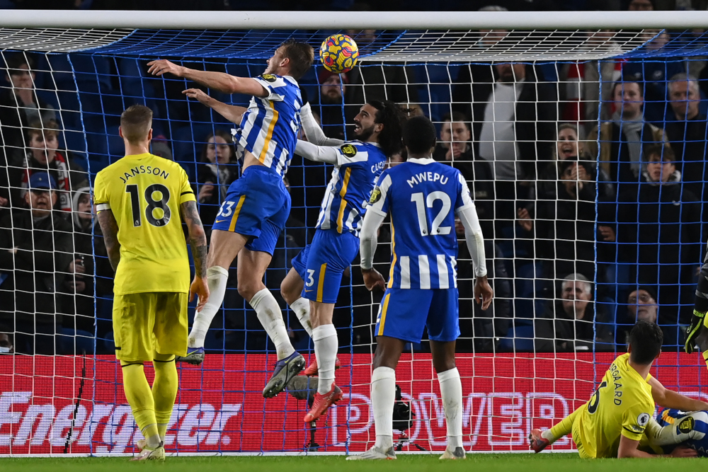 Brighton defender Marc Cucurella heads the ball off the line during the English Premier League football match against Brentford at the American Express Community Stadium in Brighton, southern England, December 26, 2021. u00e2u20acu201d AFP pic 