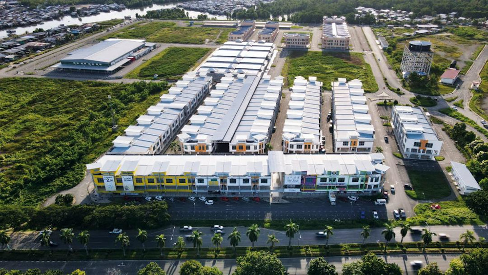 First Palm City Centre and the Lahad Datu Sentral (top left corner). — Borneo Post pic