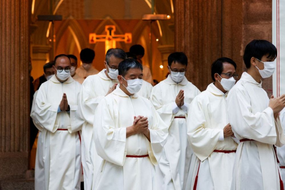 Catholic priests leave the church after the episcopal ordination of Bishop Stephen Chow in Hong Kong, China, December 4, 2021. u00e2u20acu201d Reuters pic