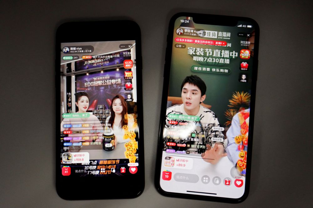 nLivestreaming sessions by Chinese livestreamers Li Jiaqi and Viya (left) are seen on Alibaba's e-commerce app Taobao December 14, 2021. u00e2u20acu2022 Reuters picn