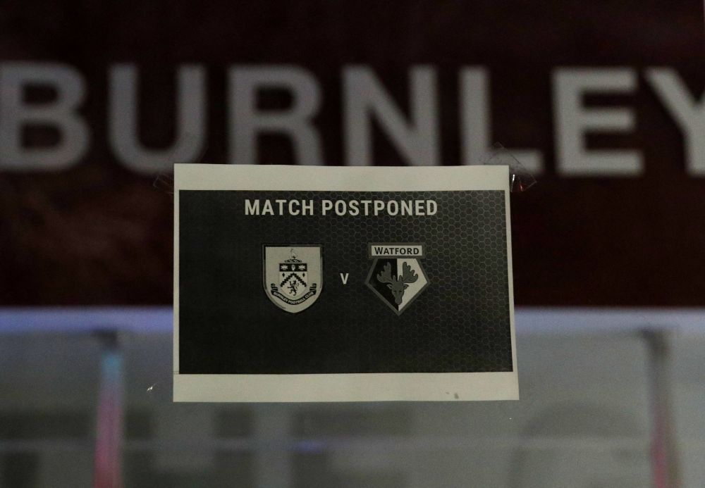 General view of a sign outside Turf Moor after the match between Burnley and Watford was postponed due to a Covid-19 outbreak in Burnley December 15, 2021. u00e2u20acu201d Reuters pic