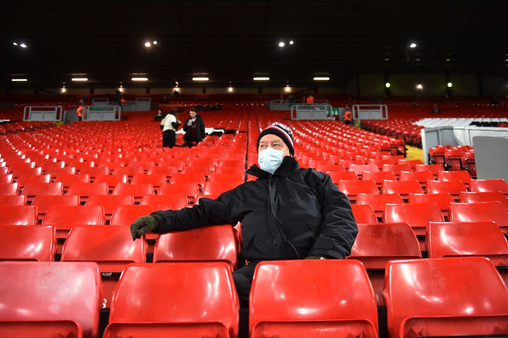 A Liverpool fan wears a protective face mask inside the stadium before the match against Newcastle United at Anfield, Liverpool December 16, 2021. u00e2u20acu201d Reuters pic
