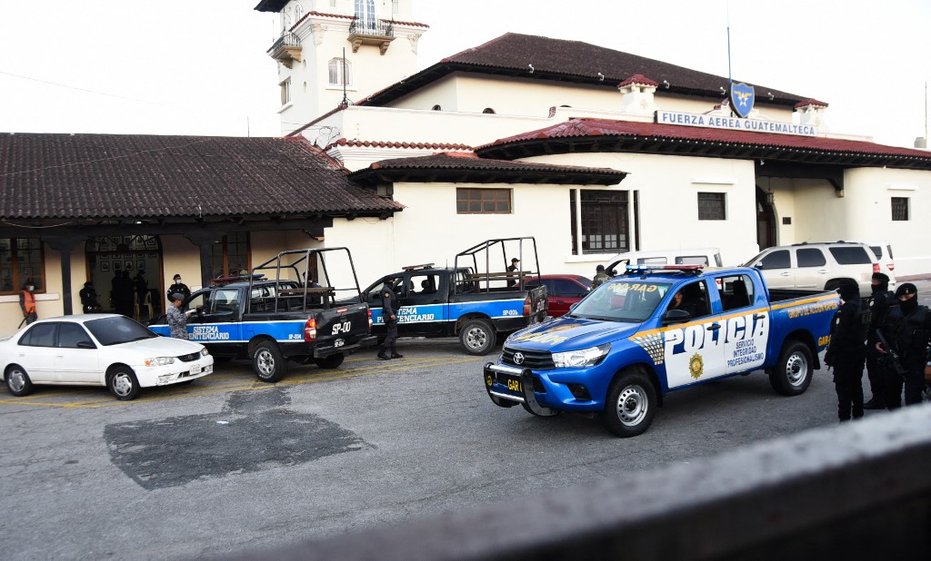 Guatemalan National Civil Police transfer Ricardo Alberto Martinelli Linares under custody, to the Guatemalan Air Force (FAG) prior to his extradition to the United States, in Guatemala city, December 10, 2021. u00e2u20acu201d AFP pic