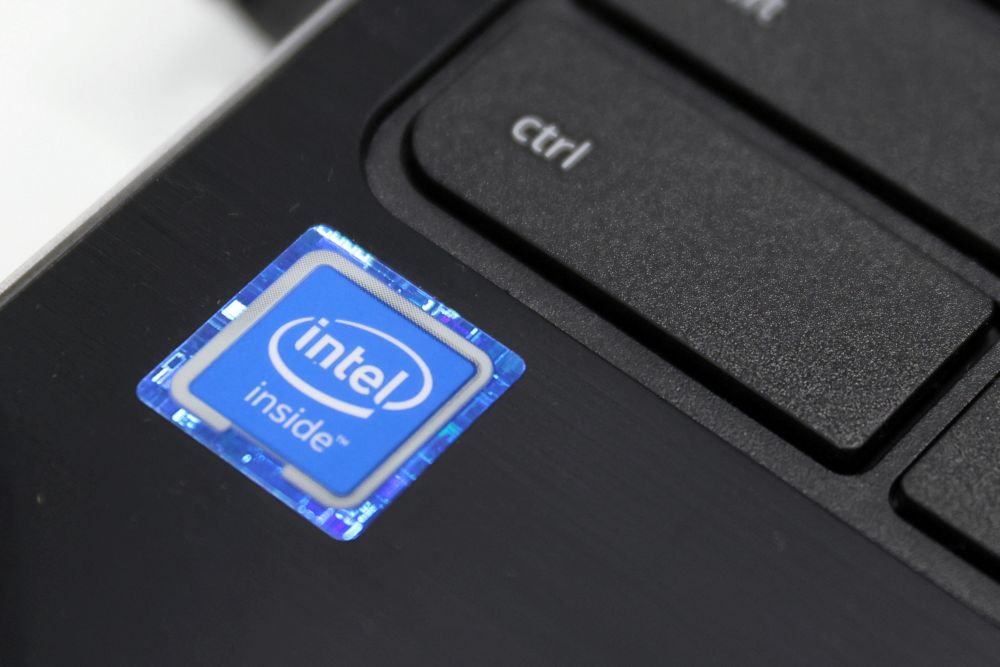 An Intel Corporation logo is seen on a sticker on a laptop for sale in Queens, New York November 16, 2021. u00e2u20acu201d Reuters picnn