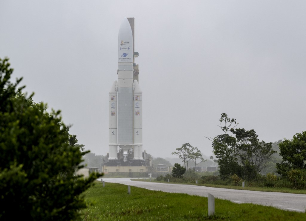 In this picture released by Nasa, Arianespaceu00e2u20acu2122s Ariane 5 rocket with Nasau00e2u20acu2122s James Webb Space Telescope onboard, is rolled out to the launch pad, on December 23, 2021, at Europeu00e2u20acu2122s Spaceport, the Guiana Space Center in Kourou, French Guiana. The teles