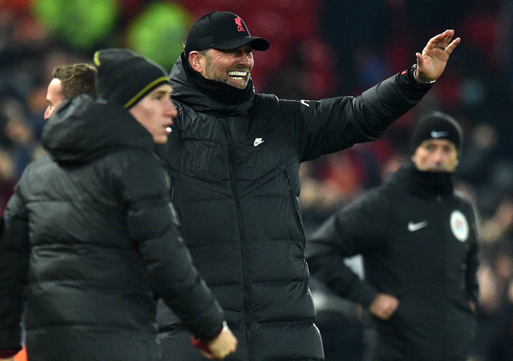 Liverpool manager Jurgen Klopp celebrates their late equaliser during the English League Cup quarterfinal football match between Liverpool and Leicester City at Anfield in Liverpool, England, December 22, 2021. u00e2u20acu201d AFP picnn