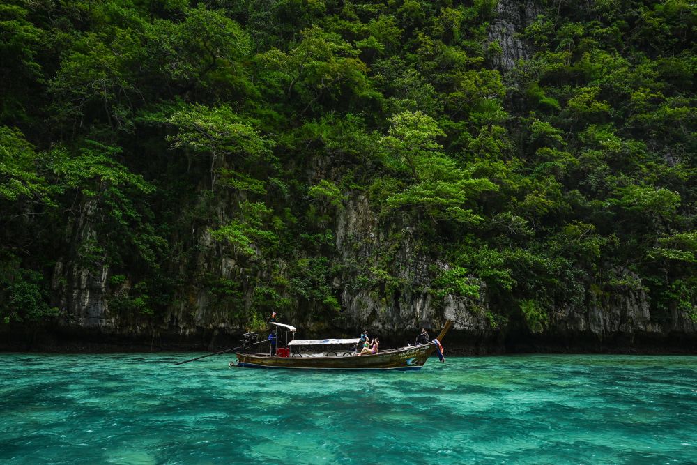 Tourists in a longtail boat visit Thailand's Phi Phi Leh island on November 26, 2021. u00e2u20acu201d AFP pic