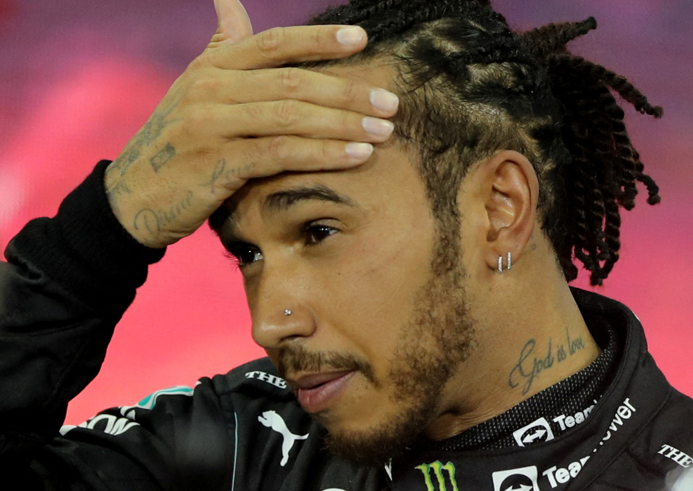 Mercedesu00e2u20acu2122 Lewis Hamilton looks dejected after finishing second in the race and the world championship at the Abu Dhabi Grand Prix, Yas Marina Circuit, Abu Dhabi, UAE, December 12, 2021. u00e2u20acu201d Reuters pic 