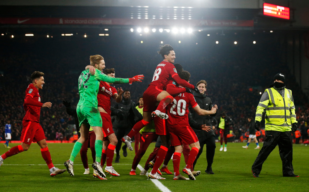 Liverpoolu00e2u20acu2122s Diogo Jota and teammates celebrates winning the penalty shoot-out in the quarterfinal match of the Carabao Cup against Leicester City at Anfield, Liverpool, December 22, 2021. u00e2u20acu201d Reuters pic 