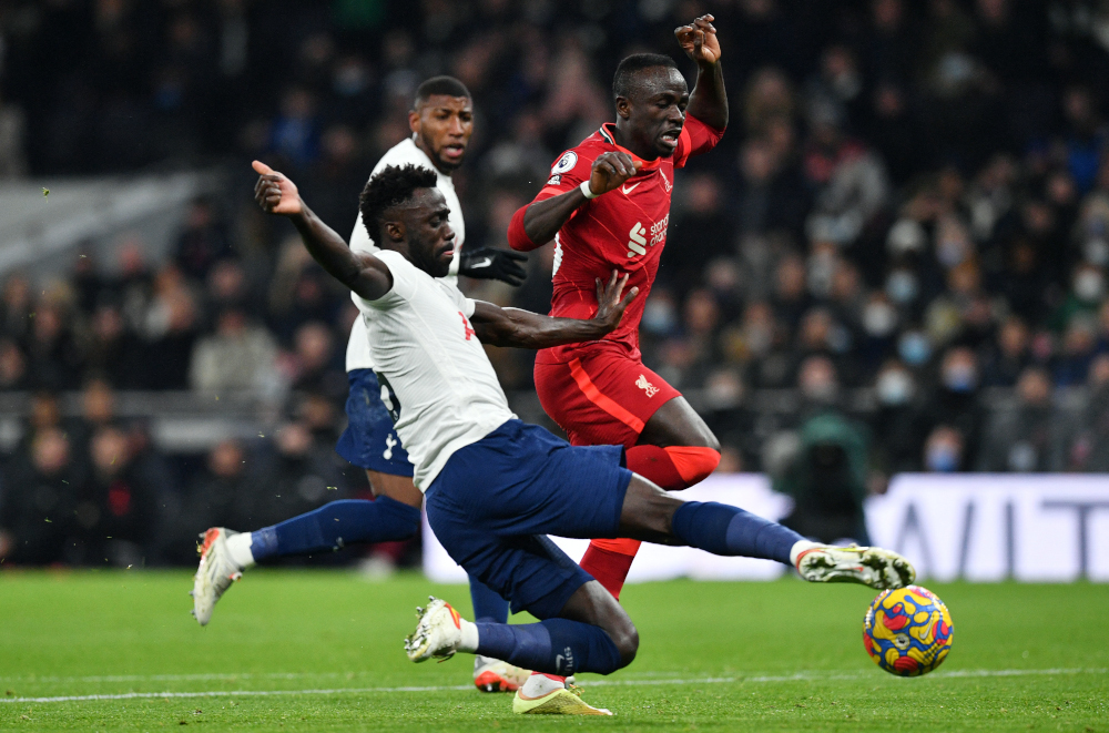 Tottenham Hotspur defender Davinson Sanchez beats Liverpool striker Sadio Mane at Tottenham Hotspur Stadium in London, December 19, 2021. u00e2u20acu201d AFP pic 