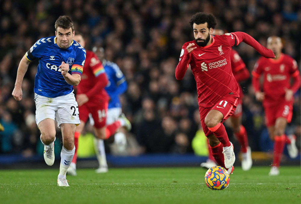 Liverpool midfielder Mohamed Salah runs past Everton defender Seamus Coleman to score his teamu00e2u20acu2122s third goal at Goodison Park in Liverpool, December 1, 2021. u00e2u20acu201d AFP pic 