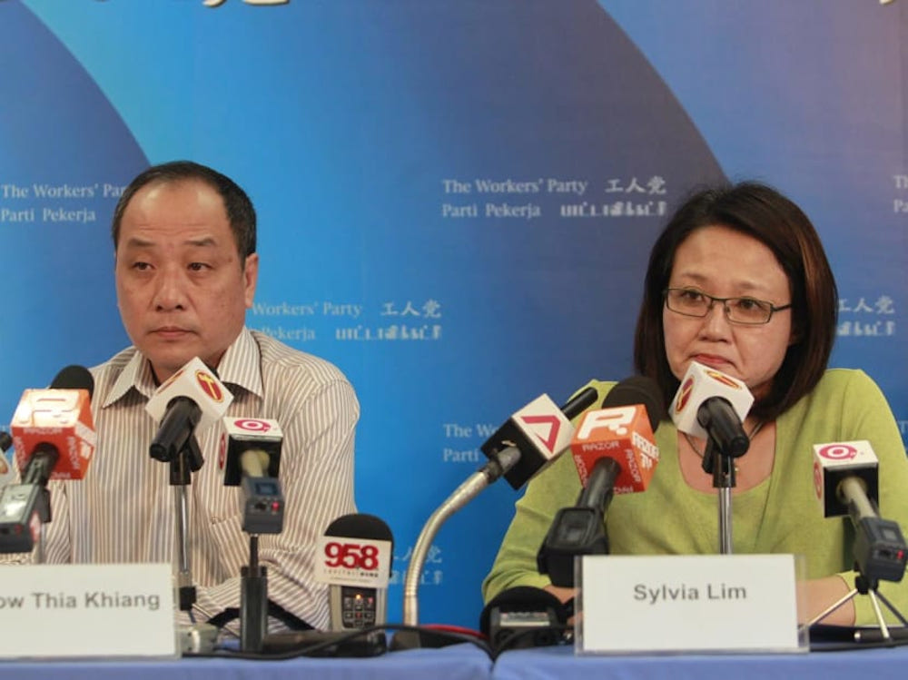 Low Thia Khiang (left) and Sylvia Lim (right) at a press conference in 2012 to announce the expulsion of former MP Yaw Shin Leong. u00e2u20acu201d TODAY file pic