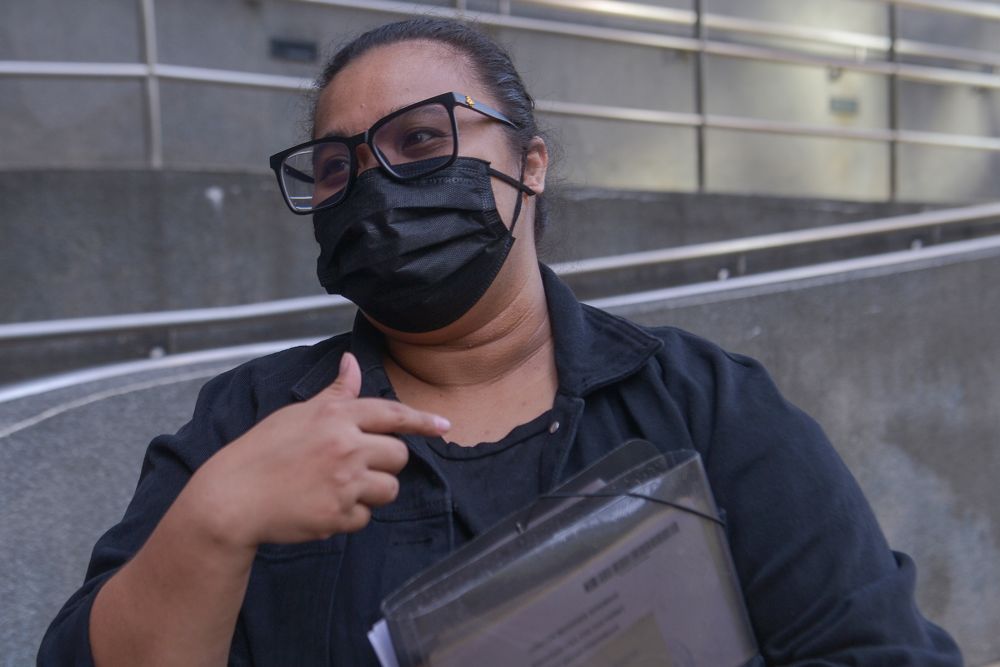 Myra Eliza Mohd Danil speaks during an interview with Malay Mail at the National Registration Department in Putrajaya December 29, 2021. 