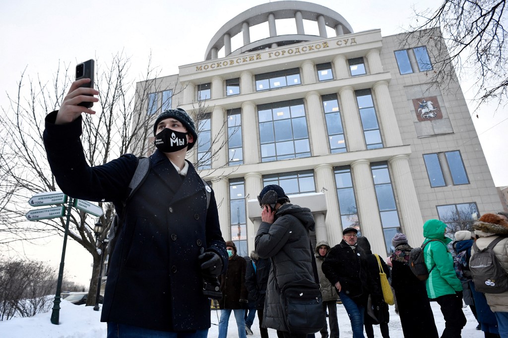 Memorial International supporters stand outside the Moscow City Court where a hearing over liquidation of Memorial's Human Rights Centre is ongoing, in Moscow on December 29, 2021. u00e2u20acu201d AFP pic