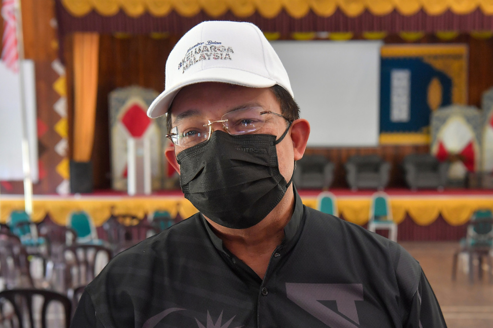 Chief Secretary to the Government Tan Sri Mohd Zuki Ali speaking to reporters after presenting compassionate payment to flood victims of six affected villages in Temerloh, December 28, 2021. u00e2u20acu201d Bernama pic