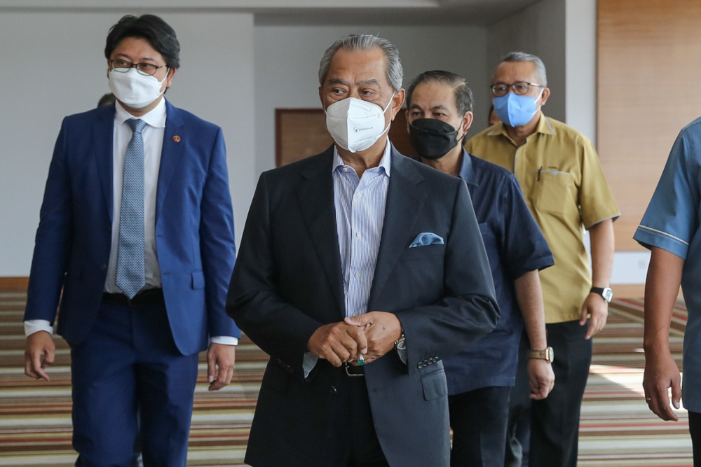 National Recovery Council chairman Tan Sri Muhyiddin Yassin arrives to attend the NRC Town Hall event at Pullman Hotel in Kuching December 15, 2021. u00e2u20acu201d Picture by Yusof Mat Isa